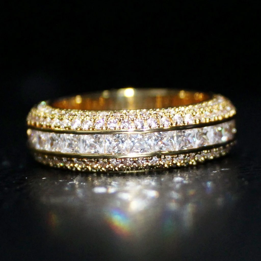 .925 Silver Princess Cut Channel Set CZ Eternity Band Ring In Gold 1 .925 Silver Princess Cut Channel Set CZ Eternity Band Ring In Gold